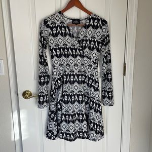 Small, long sleeve, v-neck black and white patterned dress